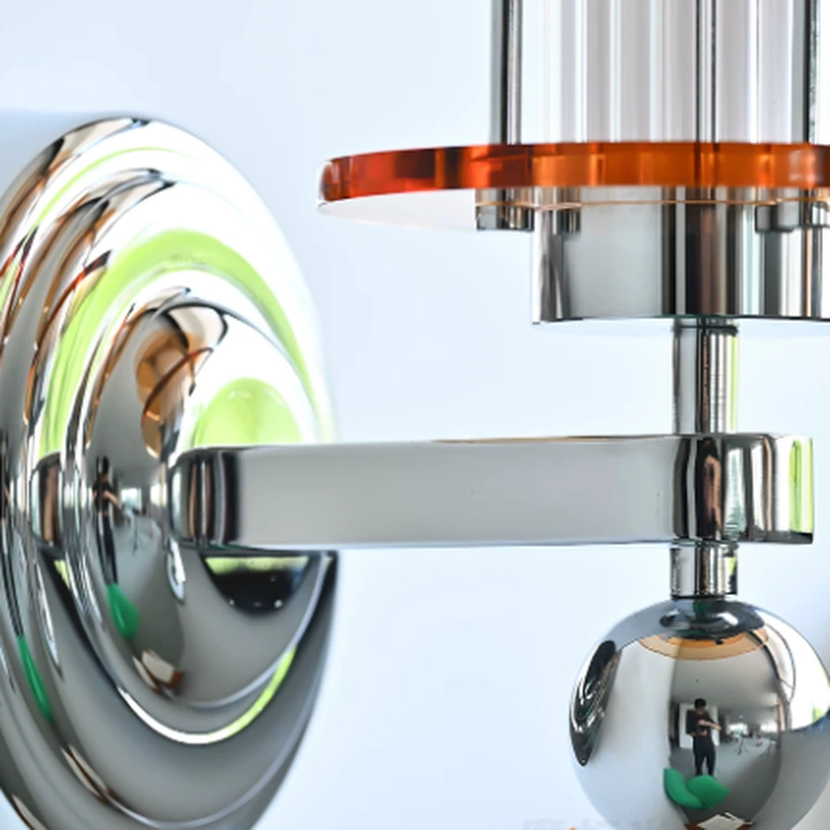 Chrome wall plate and support arm detail
