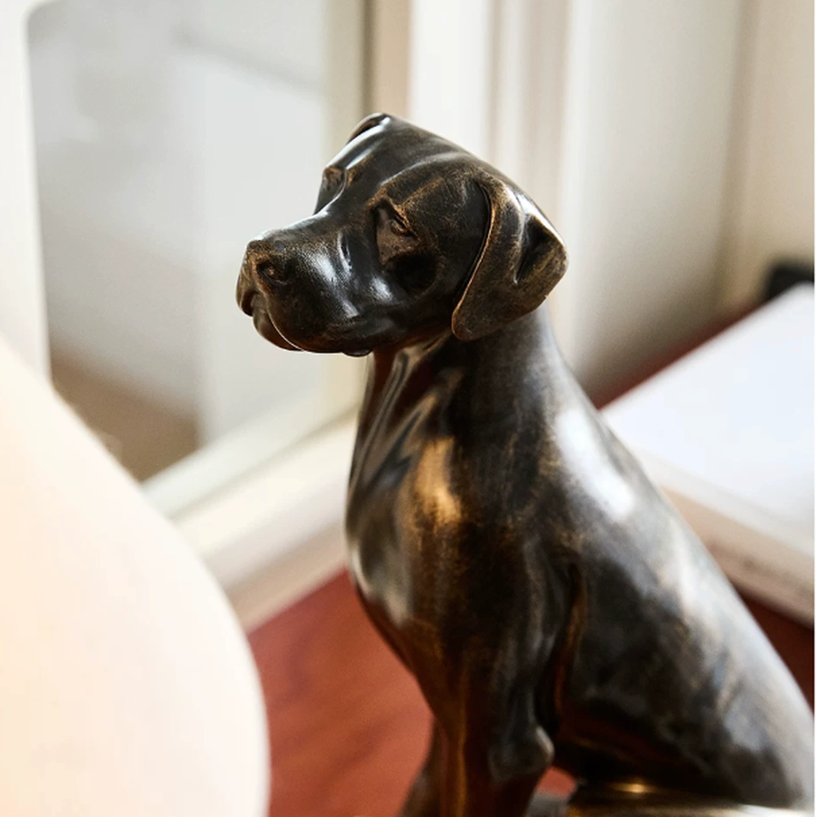 Close-up detail of the resin dog sculpture head