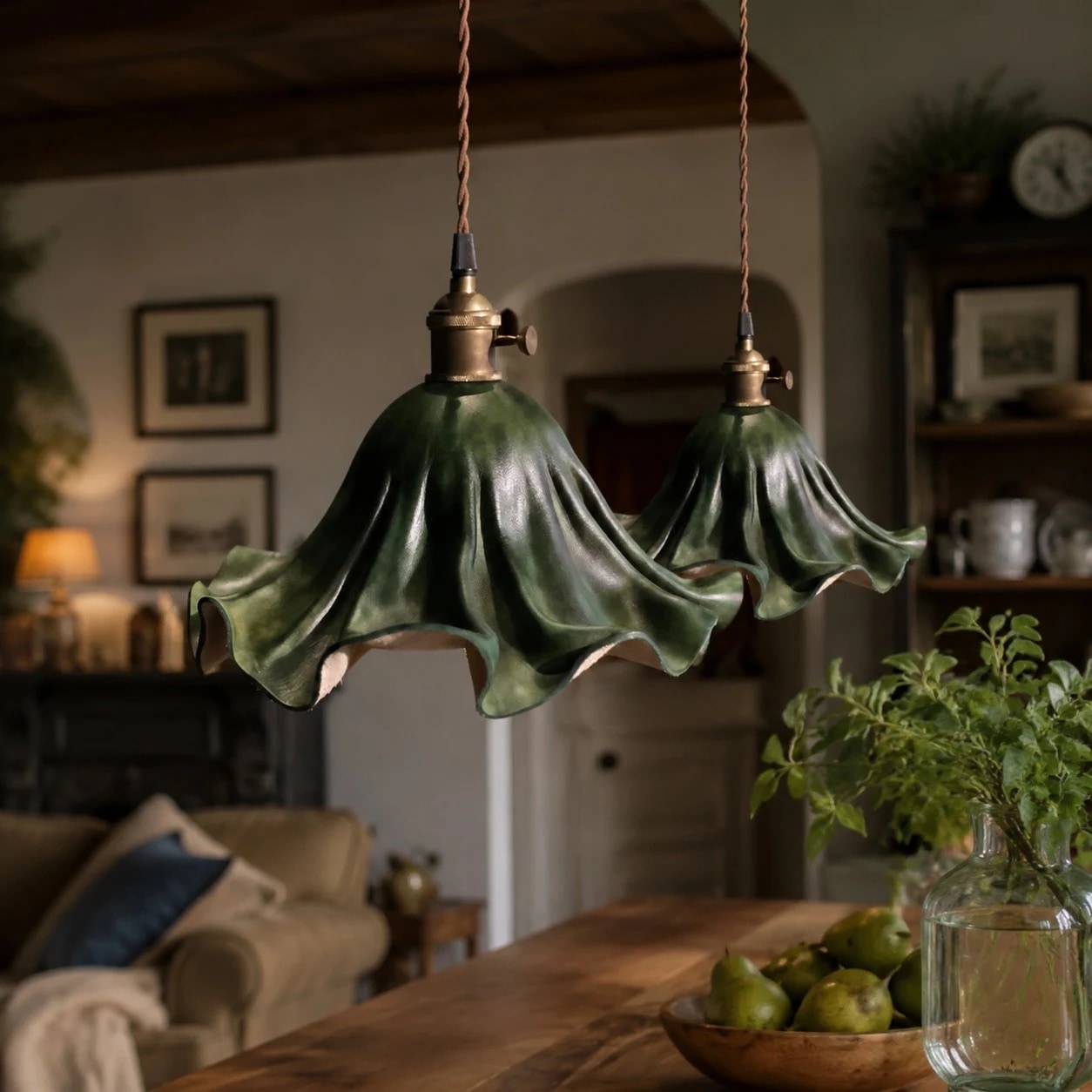 Pair of dark green leather pendant lights in a room