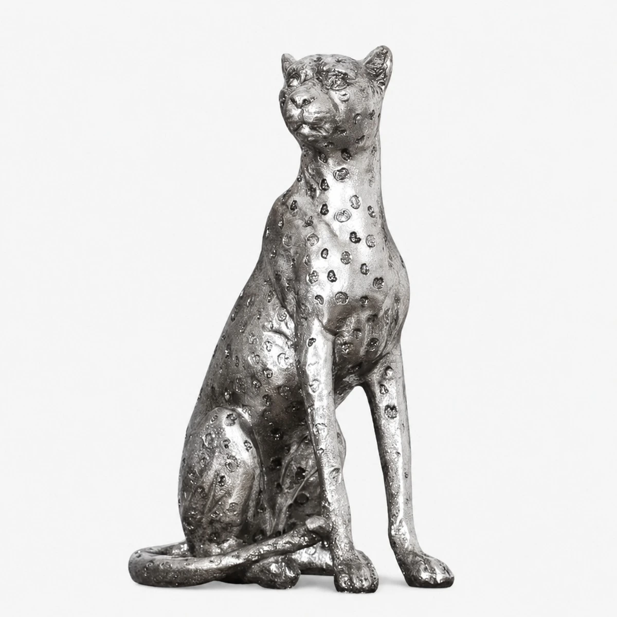 Small sitting silver leopard sculpture