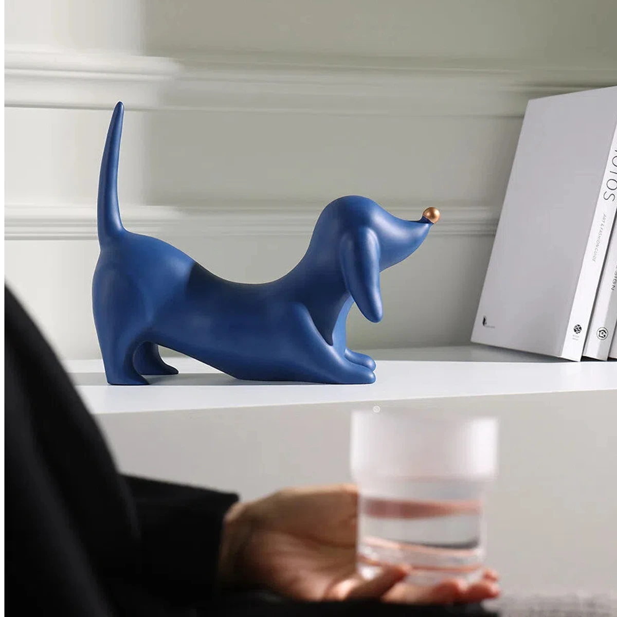 Blue beagle sculpture on a shelf