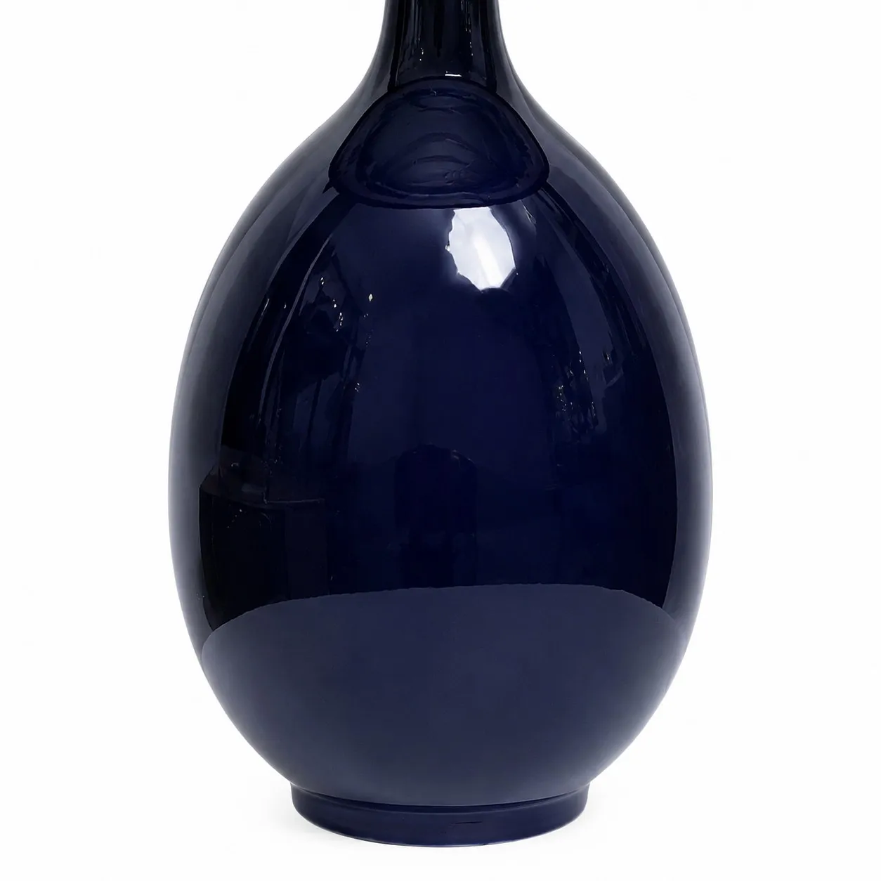 Glossy blue ceramic lamp base detail