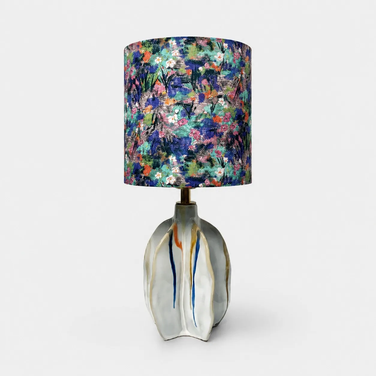 Handmade ceramic table lamp with floral print fabric shade