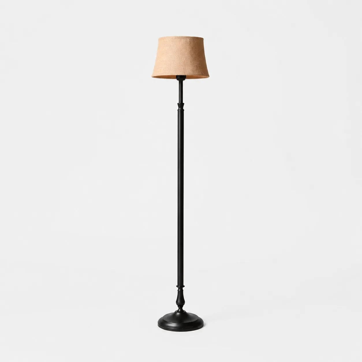 Vintage black iron floor lamp with natural linen shade
